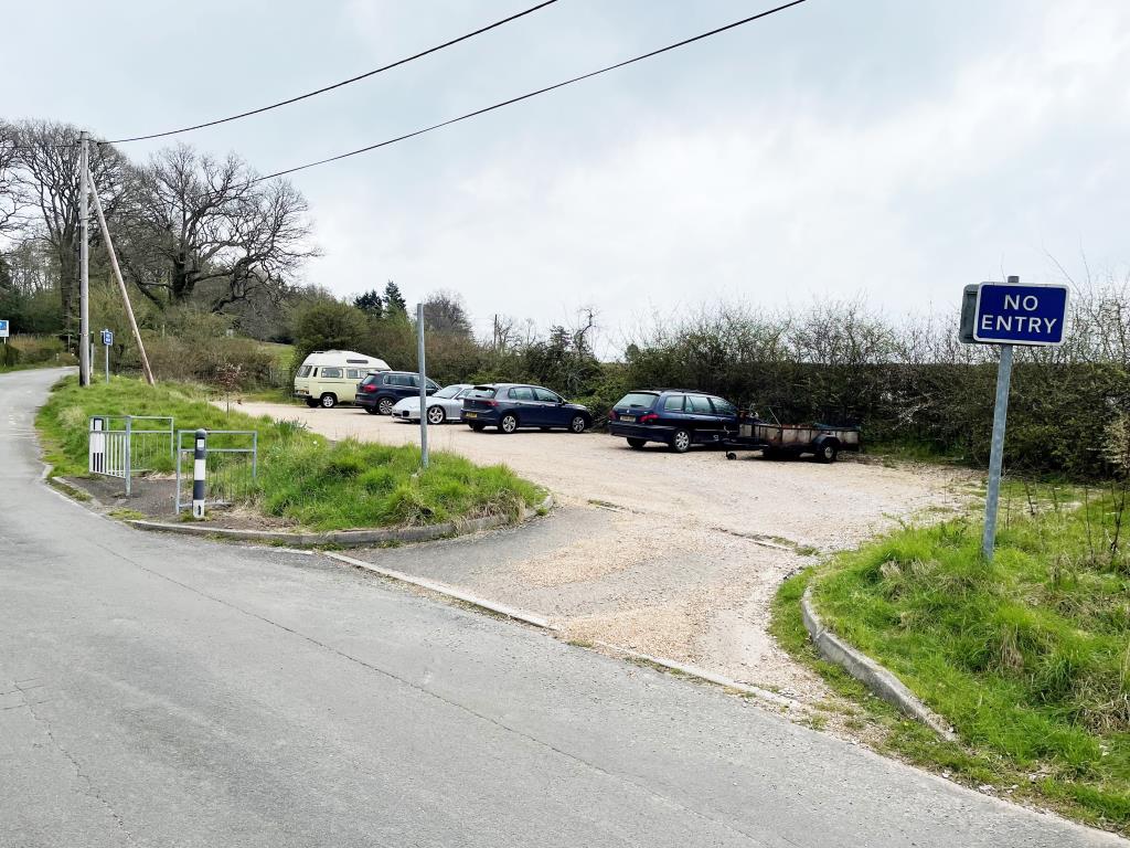Lot: 92 - FORMER AMENITY LAND WITH POTENTIAL - View of car park from lower access